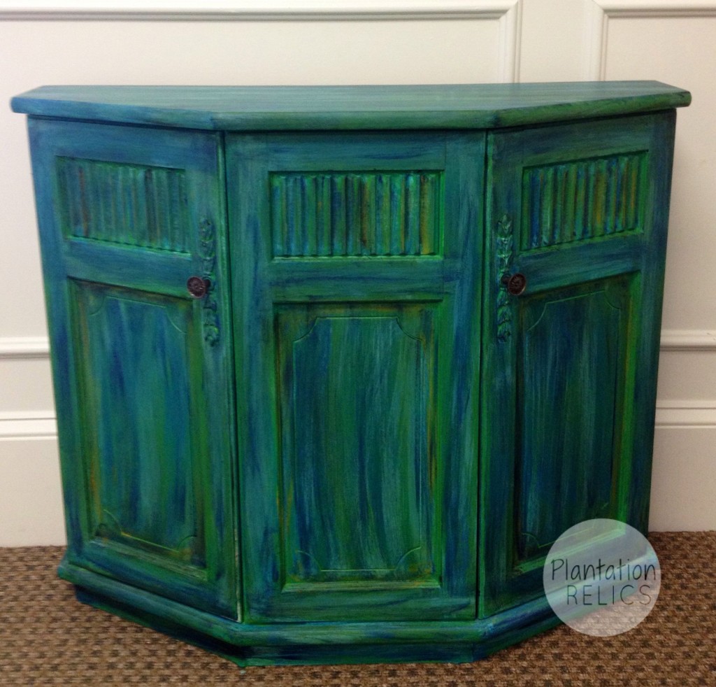 Console table with green and blue glaze