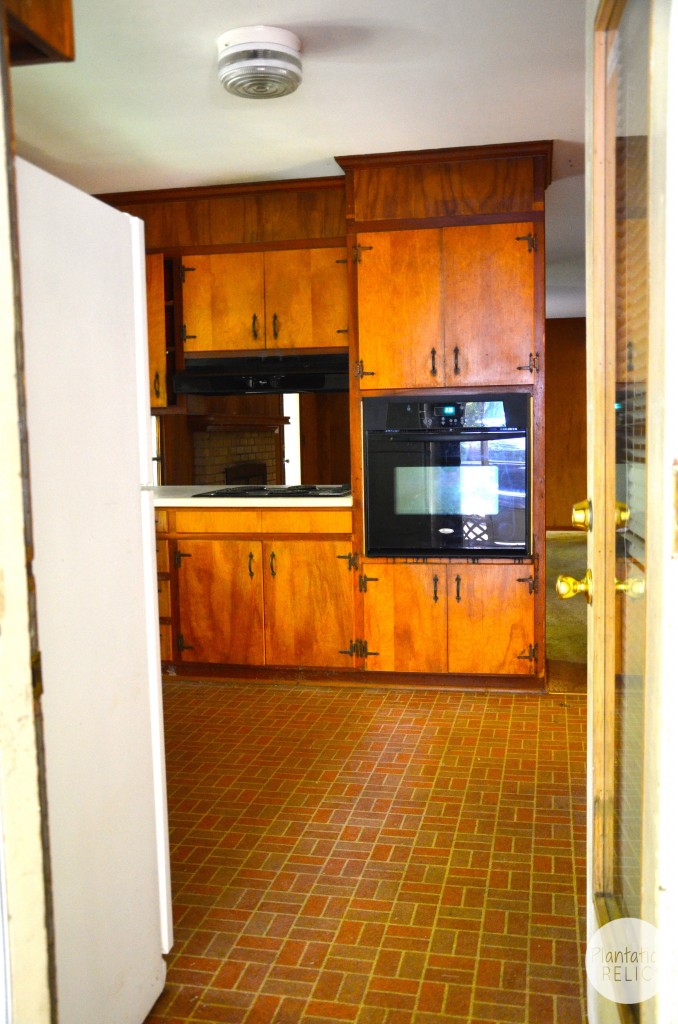 Kitchen before from the carport entry