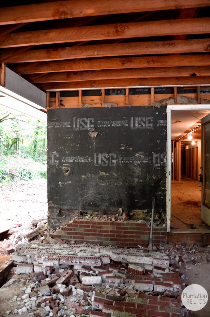 Carport Demo Brick left of door flip