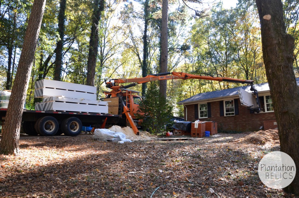 Exterior drywall loading flip