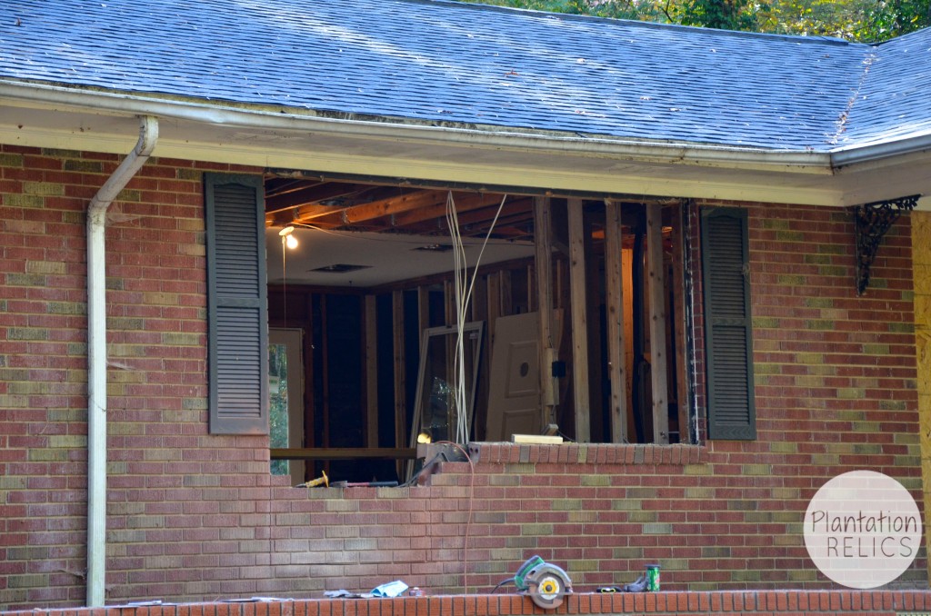 Exterior during upclose brick removal front door flip