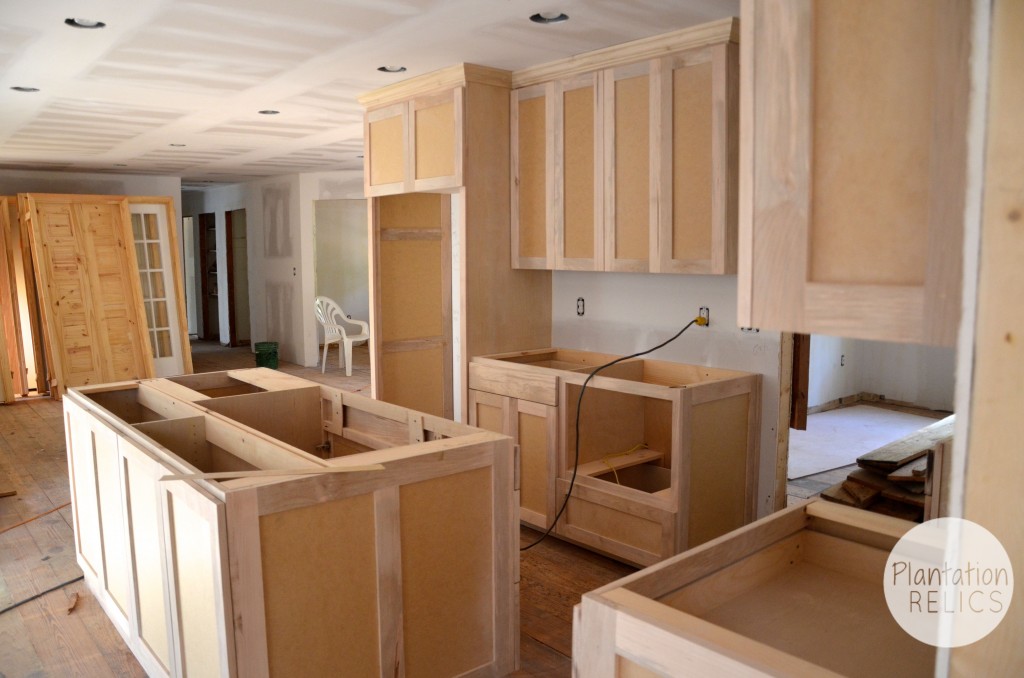 Kitchen cabinets before paint from mudroom flip