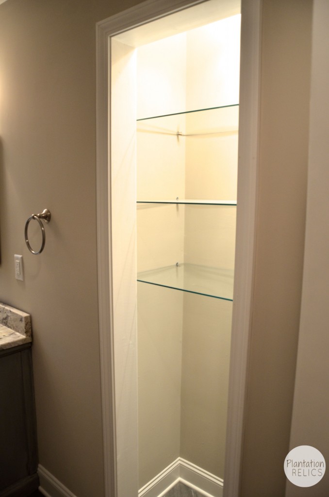 hall bath after glass shelves