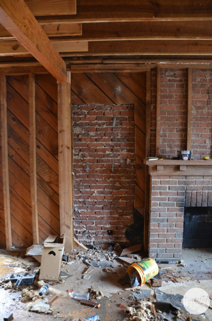 Living Room Fireplace left side brick busting out flip